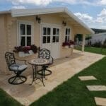 Imagine client Căsuță de grădină din lemn, 28 mp, terasa, magazie, camera, perete unic de 44mm, 7x4m, CLARA