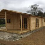 Foto client Casă din lemn izolată, 114mp, veranda, 8 camere, baie, perete dublu de 44mm + Izolație + 44mm, 6x19m BOSTON