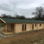 Foto client Casă din lemn izolată, 114mp, veranda, 8 camere, baie, perete dublu de 44mm + Izolație + 44mm, 6x19m BOSTON