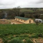 Foto client Casă din lemn izolată, 114mp, veranda, 8 camere, baie, perete dublu de 44mm + Izolație + 44mm, 6x19m BOSTON