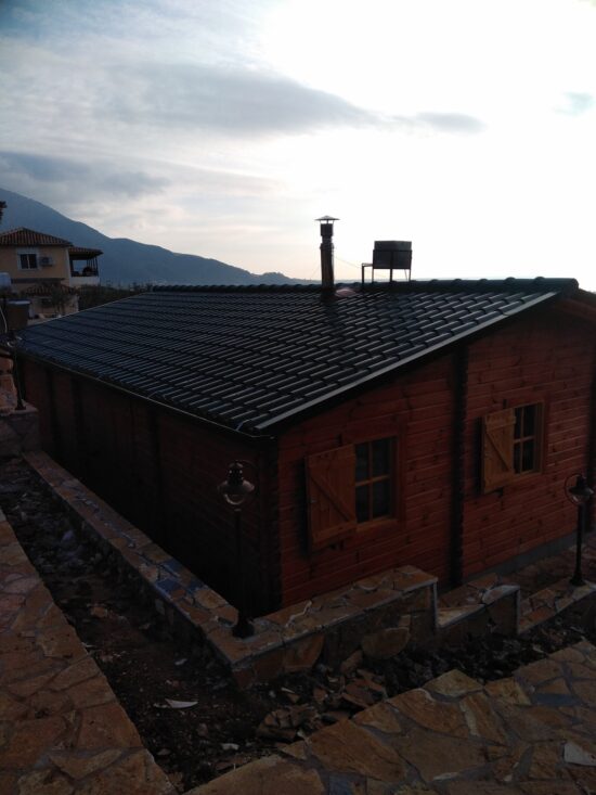 Fotografii client Casă din lemn izolată din Pin Nordic, 70 mp, cu terasă Uzes