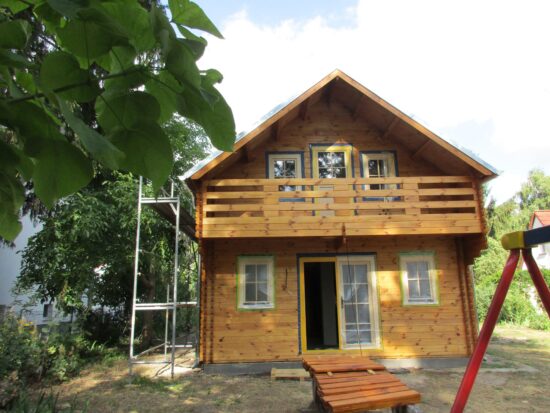Foto client 1 casa din lemn izolata cu mansarda Langon