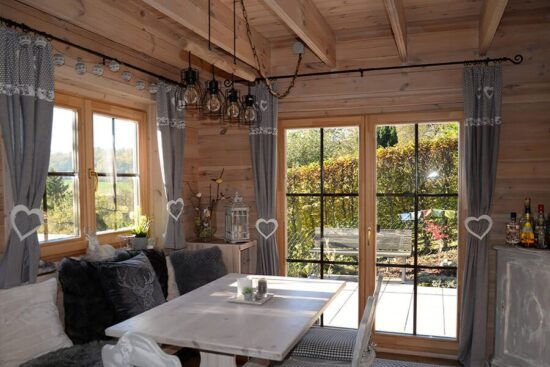 Foto client Casa din Lemn izolata rezidentiala, 70mp, cu mansarda, 5 camere, baie, Perete dublu 44+44, 8x6m, EMMA