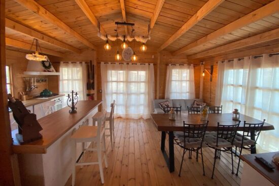 Foto client Casă din lemn izolată, 75mp, 3 camere, baie, veranda, perete dublu de 44mm + Izolație + 44mm, 13x6m, DONNA