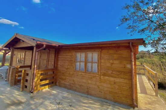 Foto client Casă din lemn izolată, 75mp, 3 camere, baie, veranda, perete dublu de 44mm + Izolație + 44mm, 13x6m, DONNA