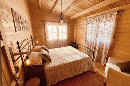 Foto client Casă din lemn izolată, 75mp, 3 camere, baie, veranda, perete dublu de 44mm + Izolație + 44mm, 13x6m, DONNA