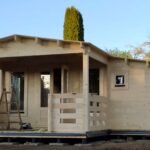 foto client Casuta din lemn de gradina cu terasa acoperita si magazie