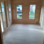 foto client Casuta din lemn de gradina cu terasa acoperita si magazie