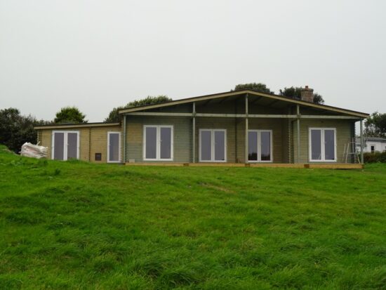 Foto client Casa din lemn rezidentiala 120 mp, 3 dormitoare, bai, veranda Riviera