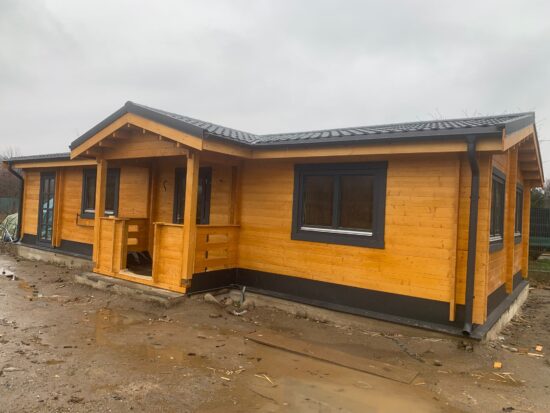 Montaj casa din lemn, izolata, model DONNA, 75 mp, cu terasă, baie, 2 dormitoare, in Dărmănești, Bacău