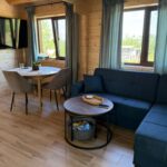 Tulcea-montaj casă din lemn modulară 52mp MIRELA living 2 dormitoare baie terasa acoperita